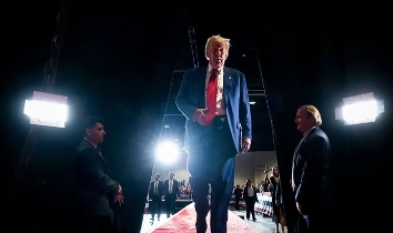 Trump walking down a red carpet