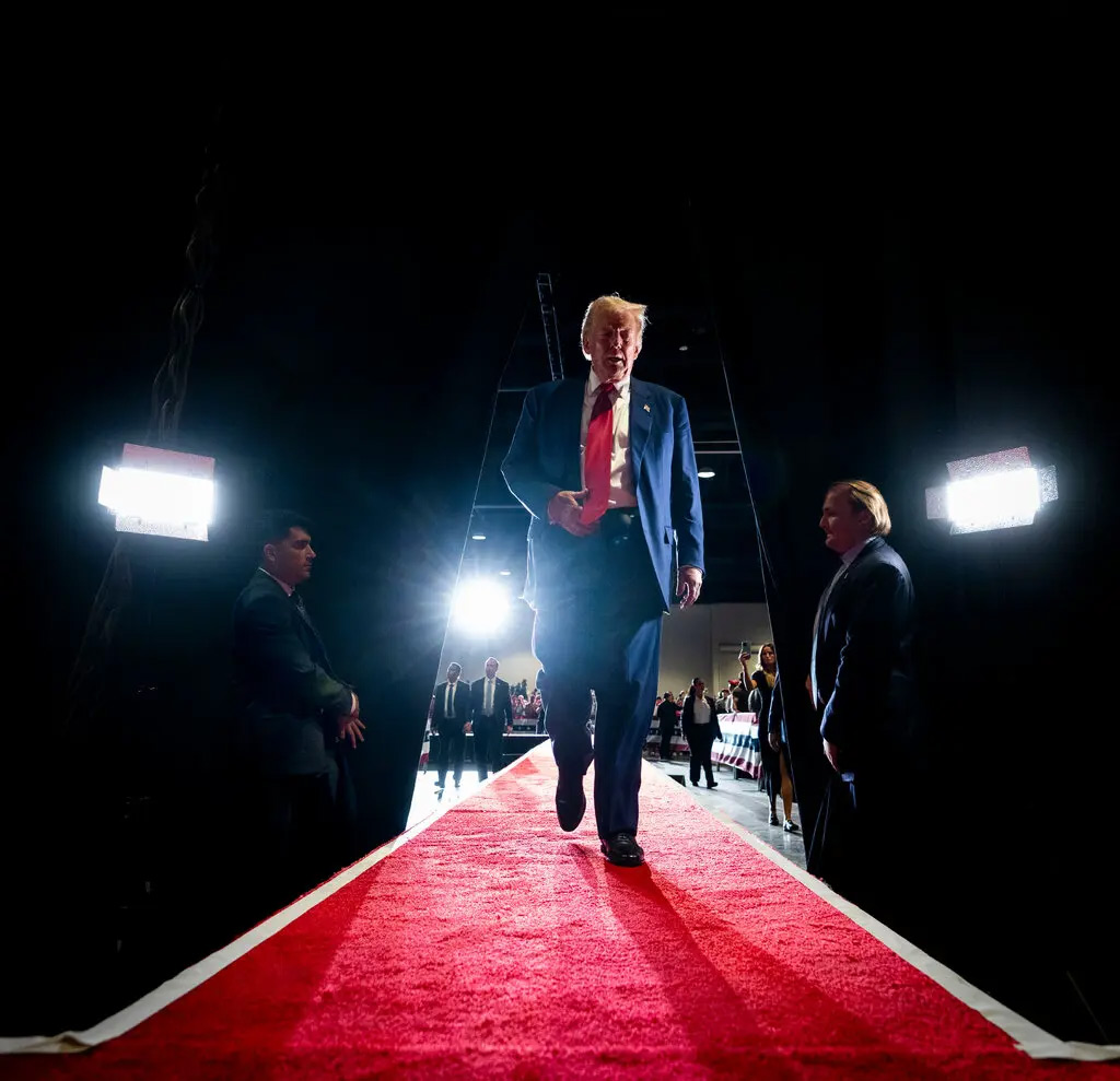 Trump walking down a red carpet